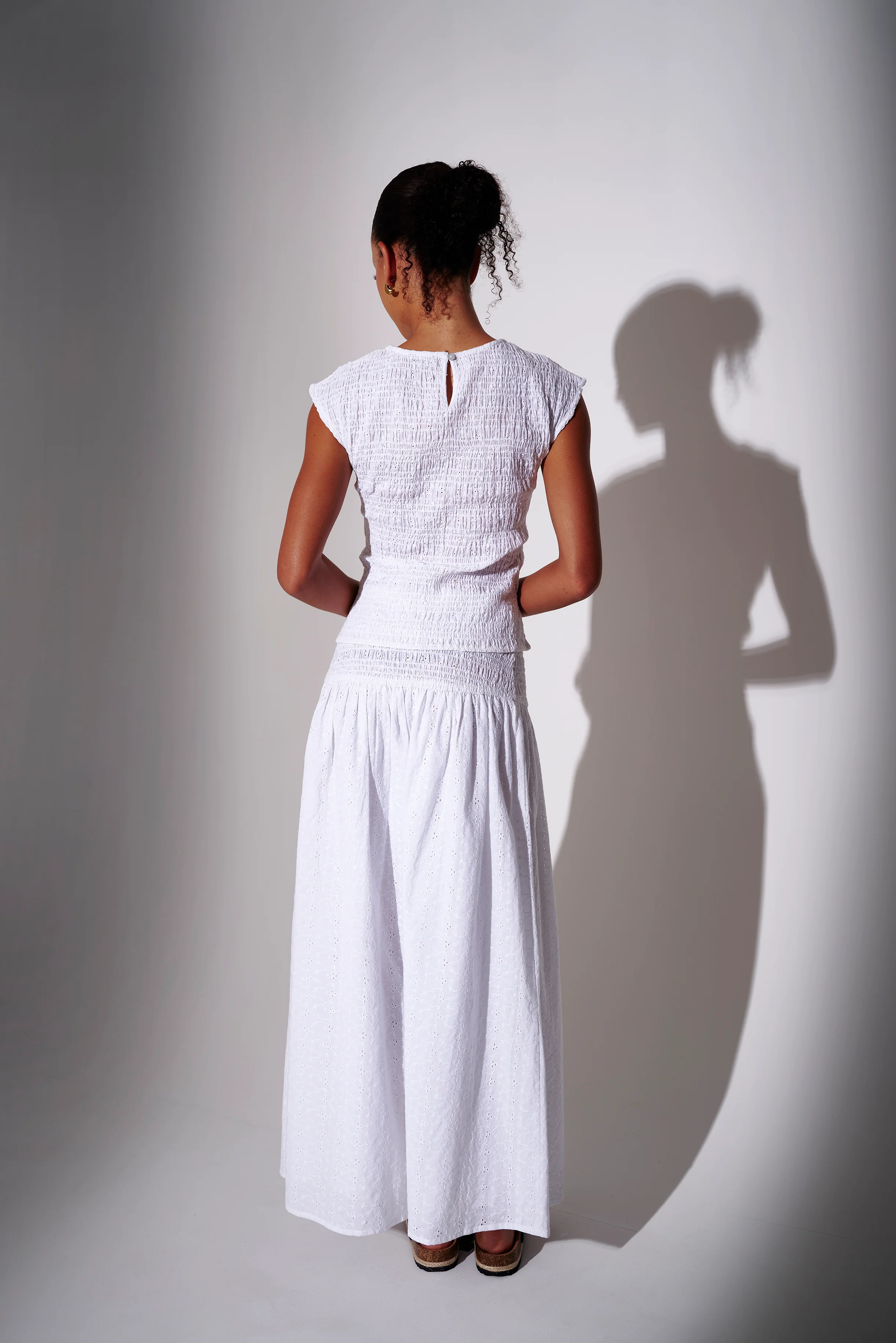 Blossom Smocked Maxi Skirt in White - Image 5